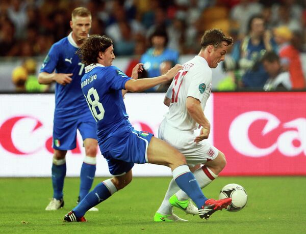 Игровой момент матча сборных Англии и Италии