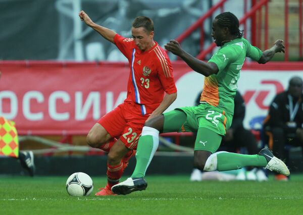 Игровой момент матча Россия - Кот-д'Ивуар 