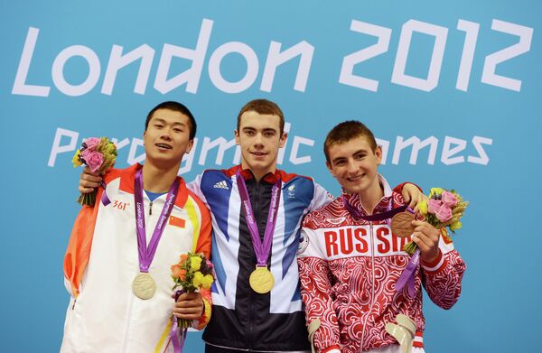 Пань Шиюнь, Джозеф Крэйг и Андрей Гладков (слева на право)