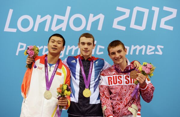Пань Шиюнь, Джозеф Крэйг и Андрей Гладков (слева на право)