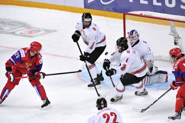 Игровой момент матча Россия - Швейцария