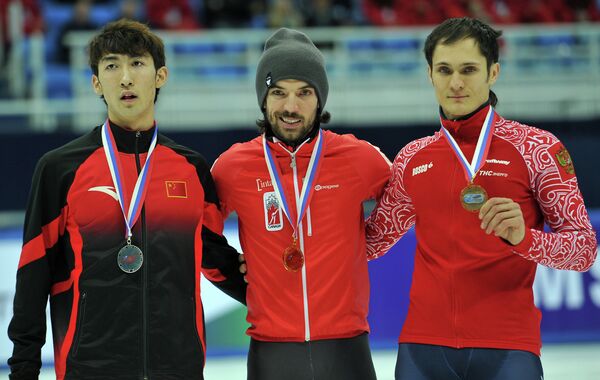Слева направо: китаец У Дацзин (второе место), канадец Шарль Амлен (первое место) и россиянин Владимир Григорьев (третье место).