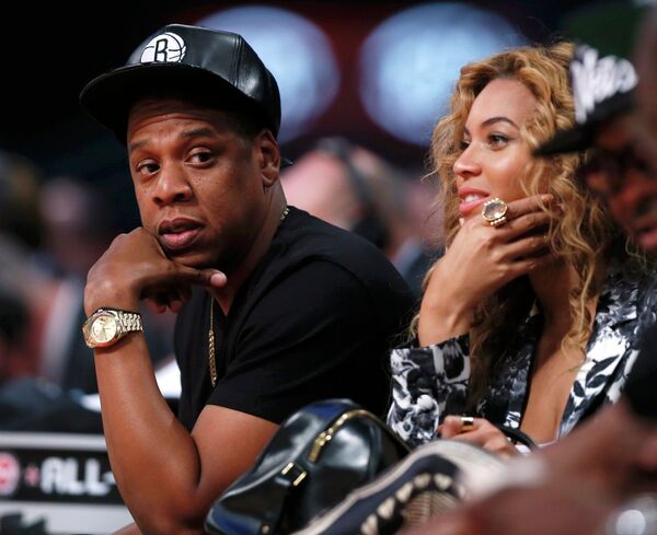Американский рэпер Jay-Z (Джей-Зи) вместе со своей супругой Beyonce (Бейонс)