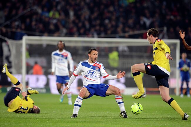 Игровой момент матча Лион - Сошо