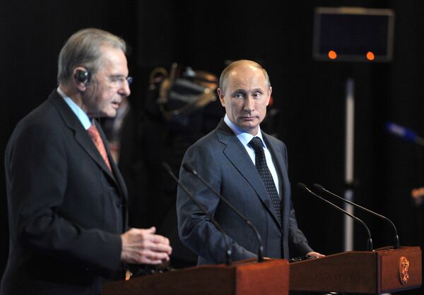 Владимир Путин (справа) и Жак Рогге