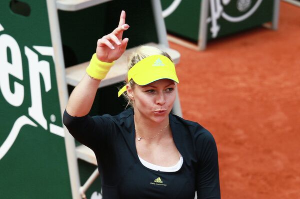 Российская теннисистка Мария Кириленко радуется победе