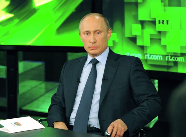 Президент России Владимир Путин во время беседы с сотрудниками телеканал Russia Today