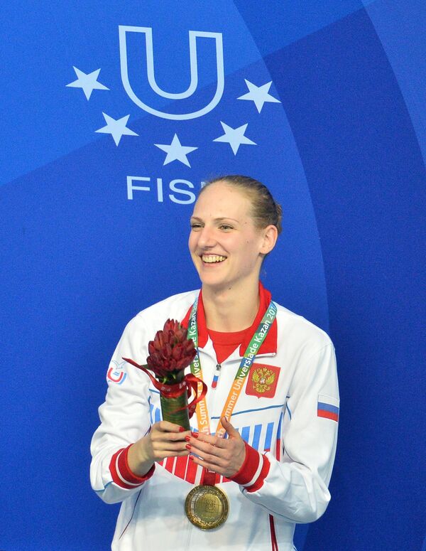 Светлана Ромашина (Россия), завоевавшая золотую медаль в соревнованиях по синхронному плаванию