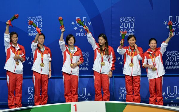 Команда Китая, завоевавшая золотые медали в командном зачете на соревнованиях по прыжкам в воду