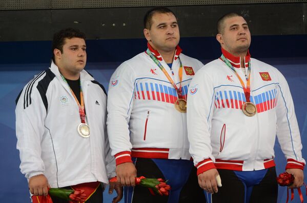 Бахадор Мулеи (Иран) - серебряная медаль, Албегов Руслан (Россия) - золотая медаль, Абуев Магомед (Россия) - бронзовая медаль