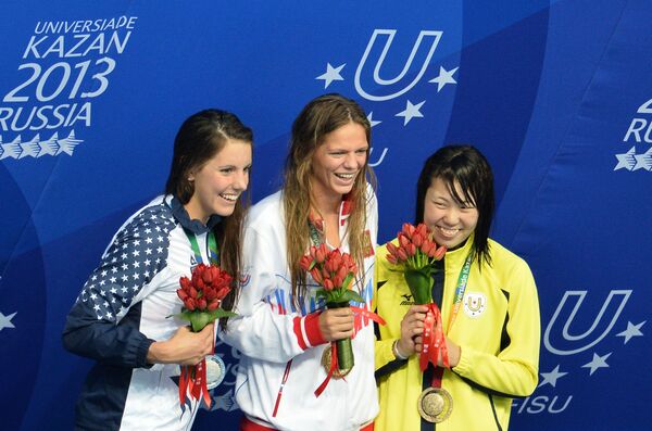 Лаура Согар (США), завоевавшая серебряную медаль, Юлия Ефимова