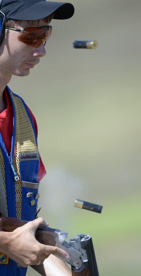 Землин Александр (Россия) во время кваликафиционных соревнований по стендовой стрельбе в упражнении скит