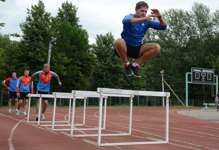 Спортсмены сборной России по санному спорту во время тренировки на стадионе Локомотив в Дмитрове