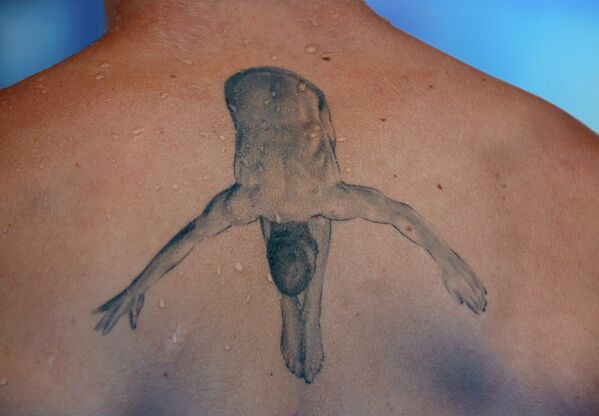 Татуировка на спине Йеспера Тольверса