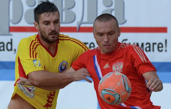 Игровой момент матча между сборными командами России и Румынии