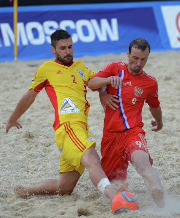 Игровой момент матча между сборными командами России и Румынии