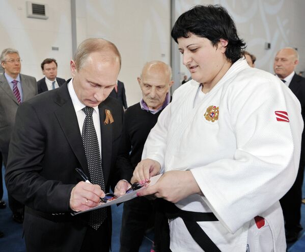 Владимир Путин (слева) и Анатолий Рахлин (в центре)