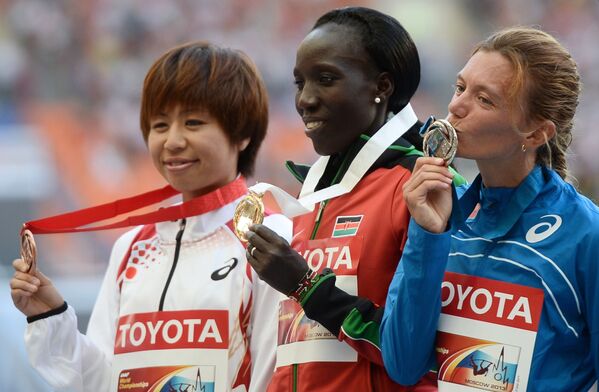 (слева направо): Кайоко Фукуши (Япония) - бронзовая медаль, Эдна Нджерингуони Киплагат (Кения) - золотая медаль, Валериа Странео (Италия) - серебряная медаль