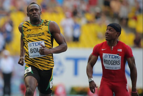 Ямайский спортсмен Усэйн Болт (слева) и американец Джейсон Роджерс
