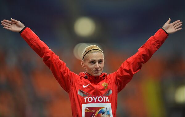 Антонина Кривошапка (Россия), завоевавшая бронзовую медаль в забеге на 400 м