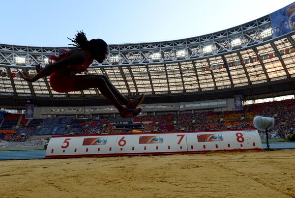 Бриттни Риз (США) в финальных соревнованиях по прыжкам в длину среди женщин