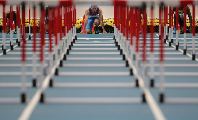 Российский спортсмен Сергей Шубенков в финальном забеге на 110 м с барьерами среди мужчин