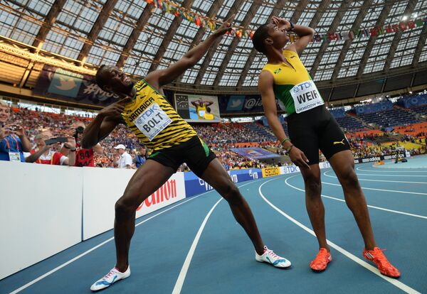 Ямайские спортсмены Усэйн Болт и Уоррен Вейр (слева направо)