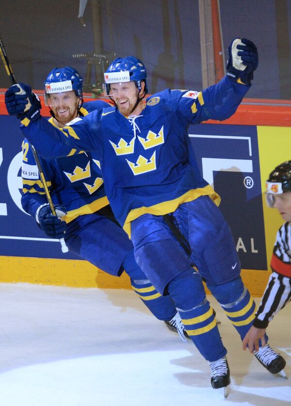 Игроки сборной Швеции Даниэль Седин (слева) и Хенрик Седин