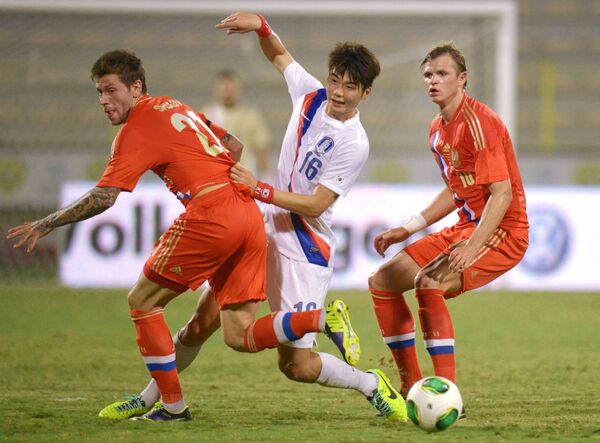 Игровой момент матча Россия - Корея