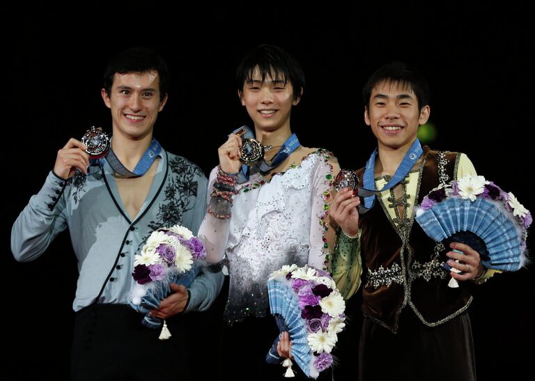 Канадец Патрик Чан и японцы Юдзуру Ханью и Нобунари Ода (слева направо)
