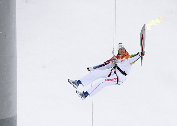 Чемпион мира по ледолазанию в 2013 года Алексей Томилов во время эстафеты олимпийского огня в Кирове