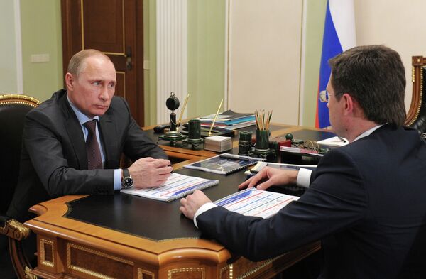 Владимир Путин (слева) и Александр Новак