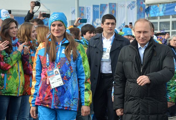 Владимир Путин (справа) и Елена Исинбаева