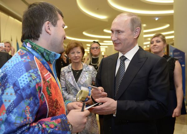 В.Путин встретился с волонтером И. Радько