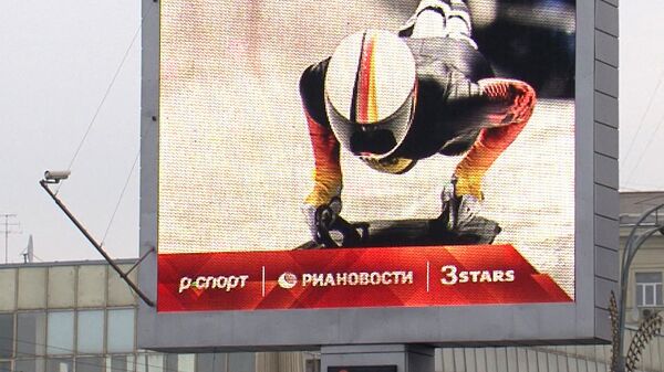 Окно в Сочи: лучшие фото с Олимпиады на медиафасадах и экранах в Москве