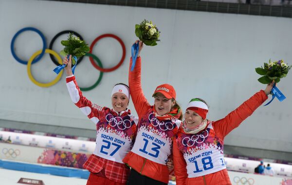Селина Гаспарин, Дарья Домрачева и Надежда Скардино (слева направо)