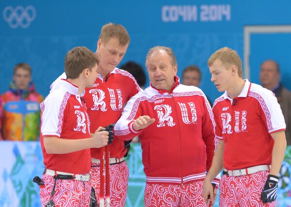 Андрей Дроздов, Петр Дрон, тренер Роджер Шмидт и Евгений Архипов (слева направо)
