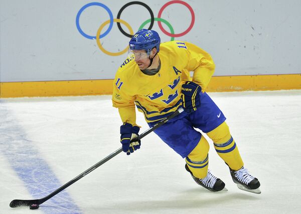 Даниэль Альфредссон (Швеция) в матче группового этапа между сборными командами Швеции и Швейцарии