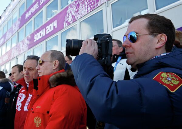 Дмитрий Медведев, Владимир Путин и Виталий Мутко (справа налево)