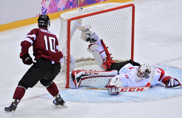Игровой момент матча Канада - Латвия