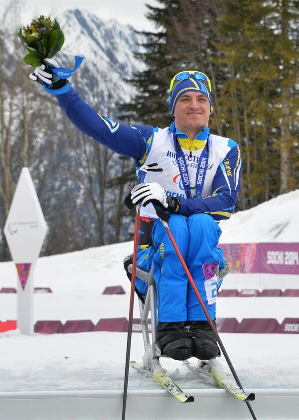 Максим Яровой (Украина), завоевавший серебряную медаль в гонке на дистанции 10 км в классе LW 10-12 (сидя)