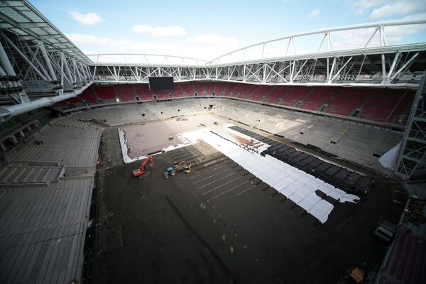 Строительство комуникационной системы дренажа футбольного поля стадиона Открытие Арена в московском районе Тушино