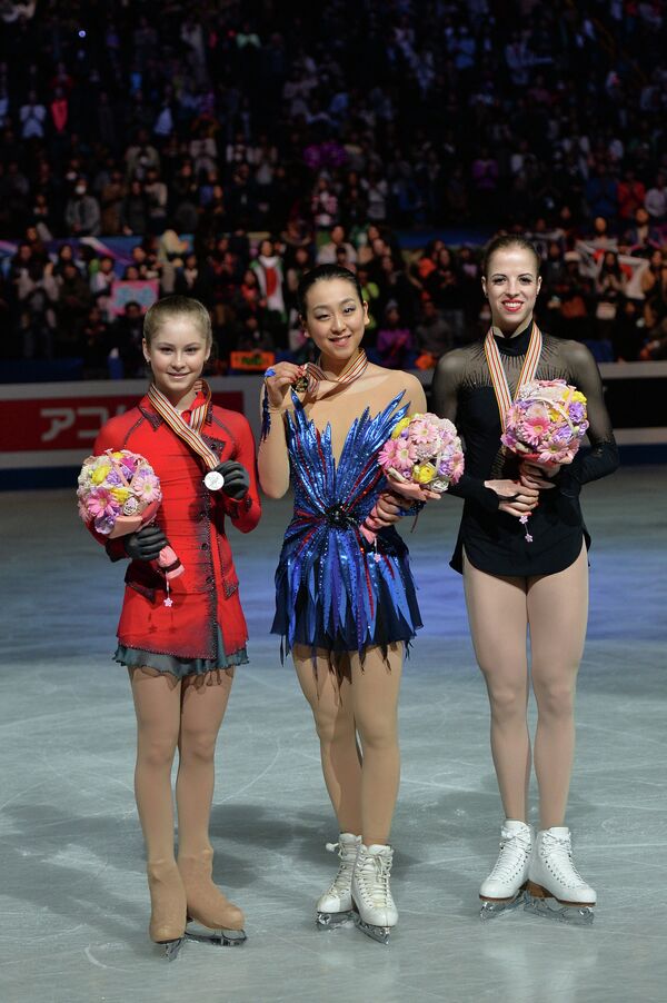 Юлия Липницкая (Россия) - серебряная медаль, Мао Асада (Япония) - золотая медаль, Каролина Костнер (Италия) - бронзовая медаль.
