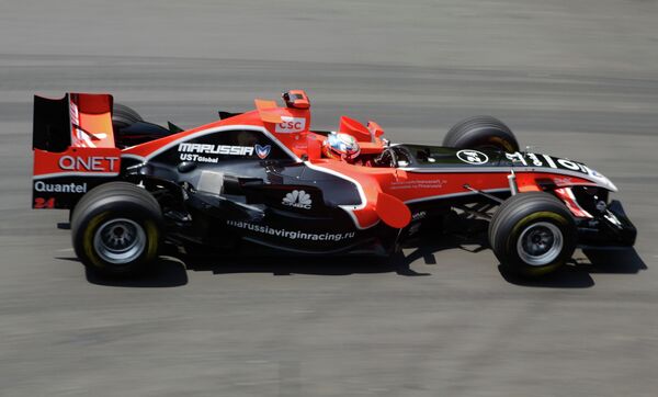 Пилот команды Marussia Virgin Жером Д`Амброзио во время Фестиваля автомобильного спорта Формула Сочи в 2011 году