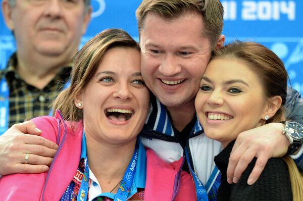 Елена Исинбаева, Алексей Немов и Алина Кабаева (слева направо)
