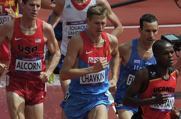 Российский спортсмен Николай Чавкин (в центре)