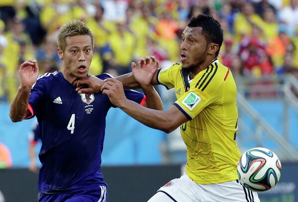 Игровой момент матча Япония-Колумбия