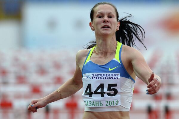 Светлана Топилина - победительница в беге на 100 метров с барьерами