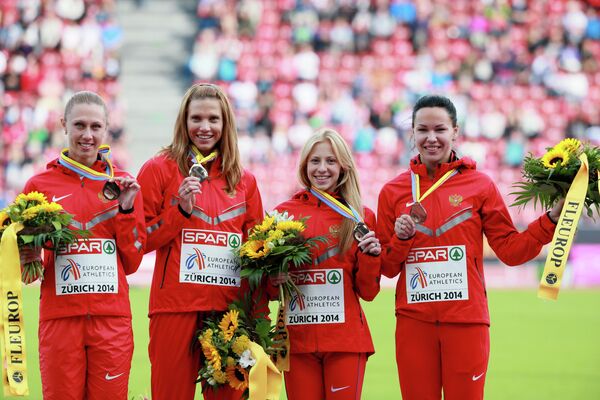 Российская сборная в составе Марины Пантелеевой, Натальи Русаковой, Кристины Сивковой и Елизаветы Савлинис (слева направо)