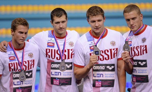 Спортсмены из России Андрей Гречин, Никита Лобинцев, Александр Сухоруков и Владимир Морозов (слева направо)